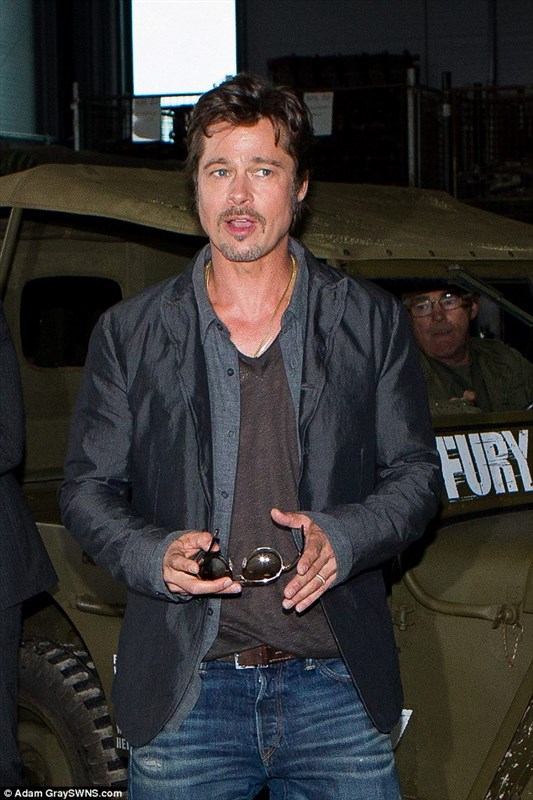 Brad Pitt shows off his wedding ring for the first time after marrying Angelina Jolie